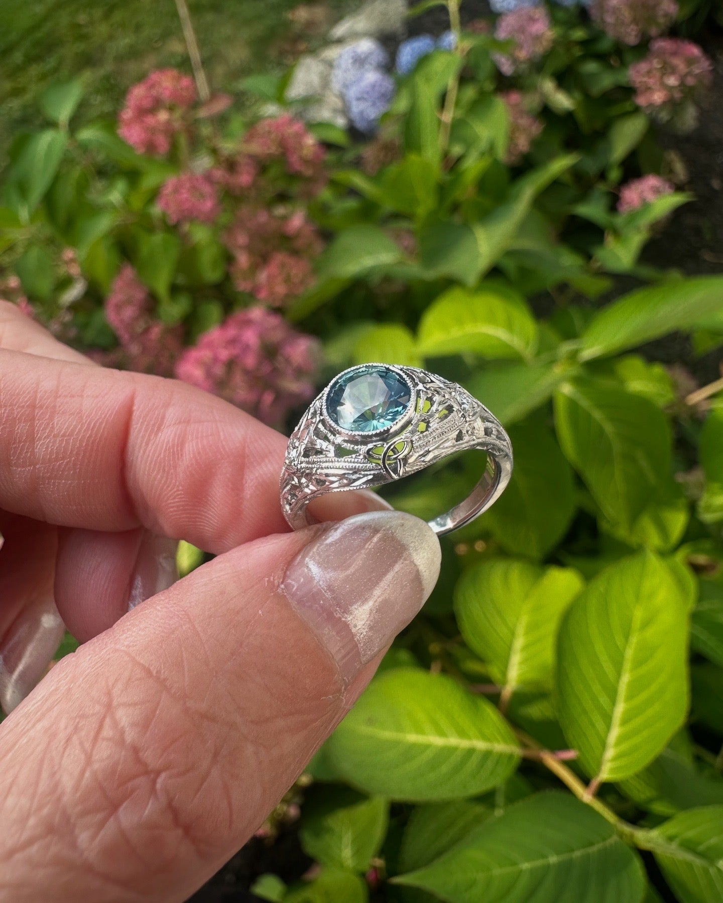 Handcrafted Platinum Teal Sapphire Engagement Ring